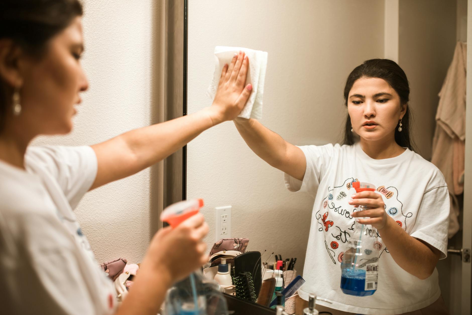 Clean bathroom glass and mirrors with fewer water spots