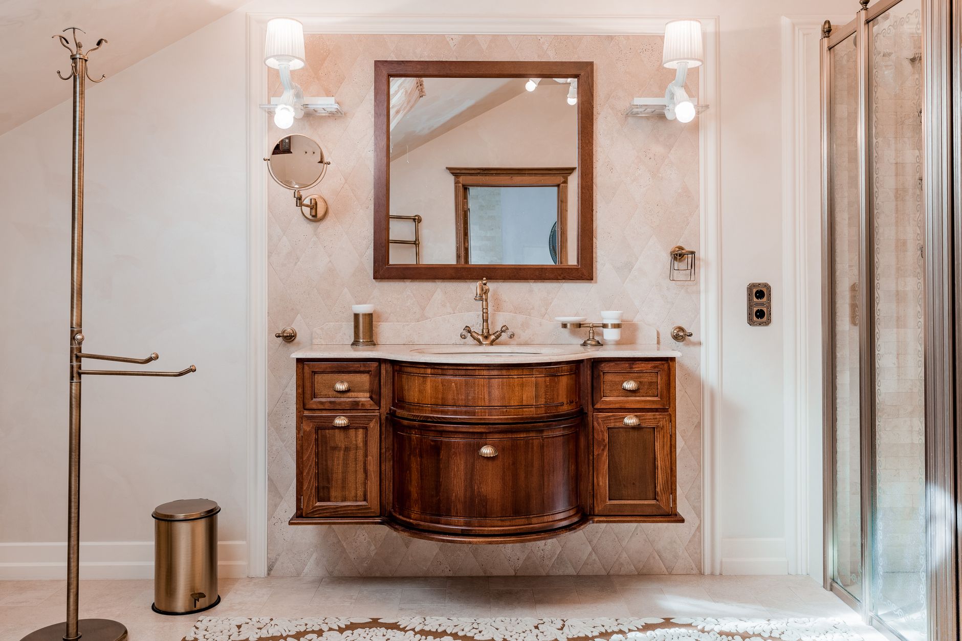 A modern bathroom with a wooden vanity and mirror