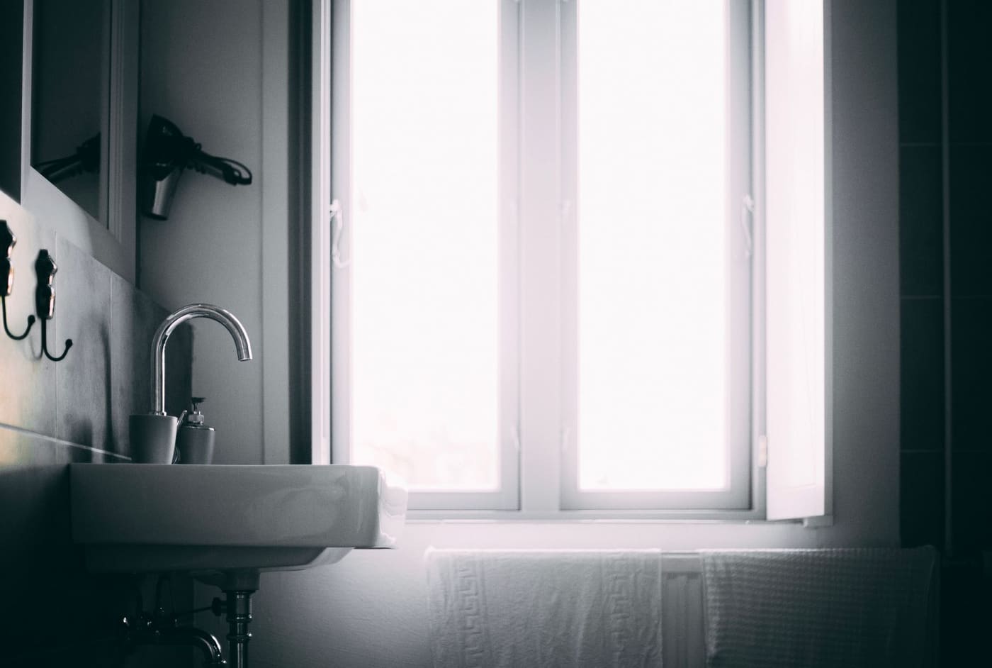 Bright bathroom with a sleek sink and natural light
