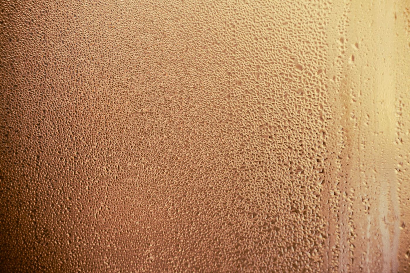 Condensation droplets covering a glass surface